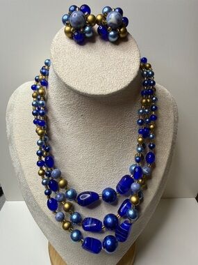 Vintage Japan Blue lucite Triple-Strand Necklace and Clip Earrings goldtone